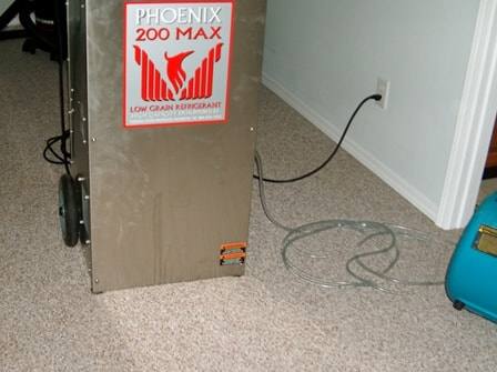 Phoenix 200 Max commercial-grade dehumidifier on-site for structural drying after water damage